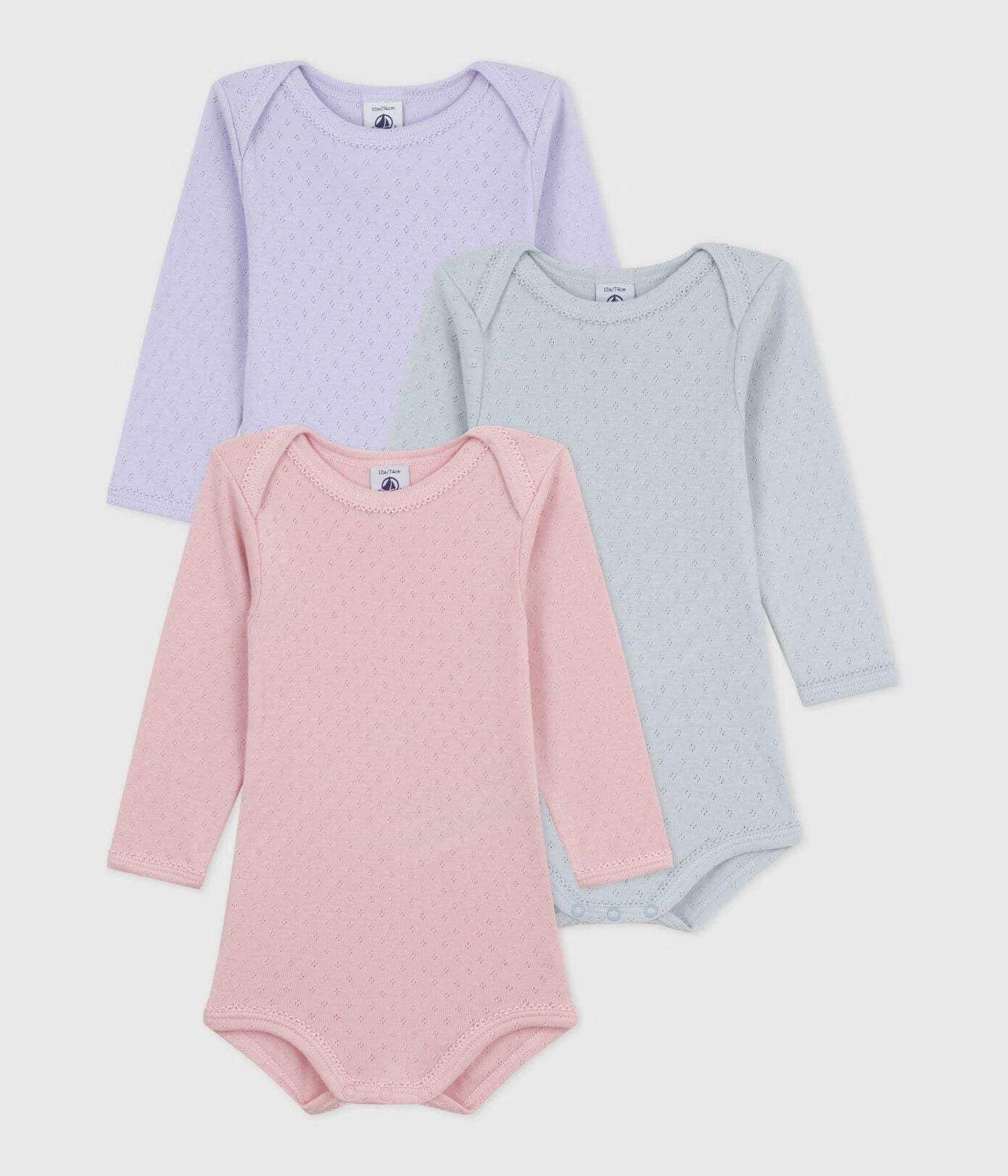 Set langärmeliger Baby-Bodys aus Baumwolle mit Lochstickerei